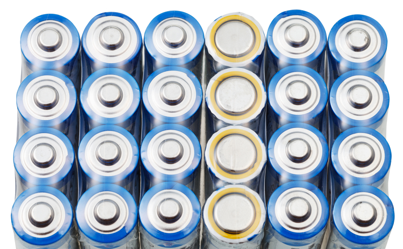 many AA electric batteries close up